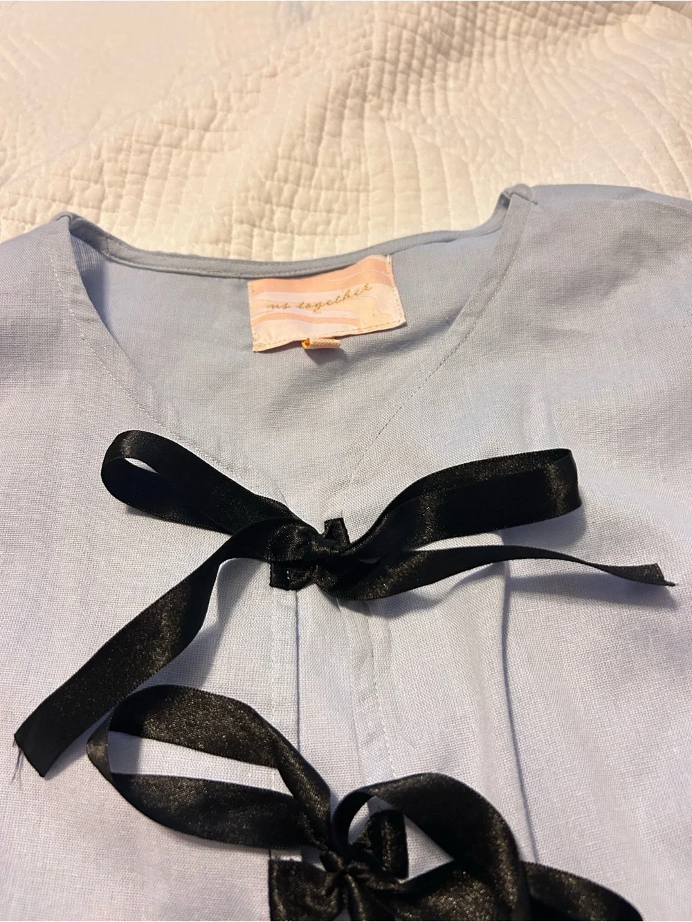 Shorts and blouse light blue set .